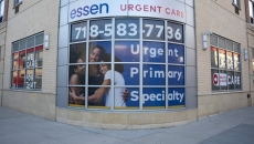 Essen Urgent Care sign on curved building