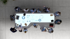People gathered at meeting table