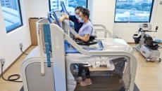 A patient under ​​gait training using the AlterG Anti-Gravity Treadmill from Stroke Support Station.