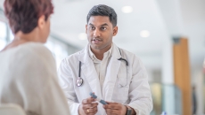Doctor talking to patient
