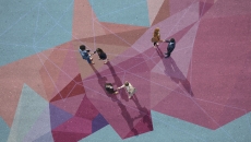 Businesspeople on painted pattern on asphalt