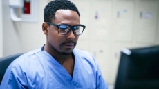 Clinician looking at computer screen