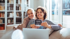 Couple sharing ultrasound photo
