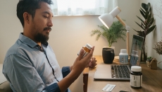 Person looking at perscription bottle