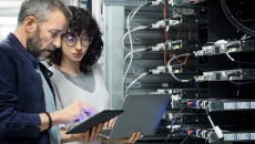IT and security professionals in a server room