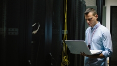 IT worker restores systems in server room