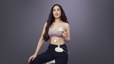 person wearing Elvie breast pump