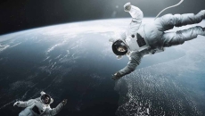 Astronauts above the earth