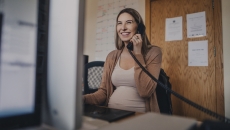 Pregnant person talking on the phone