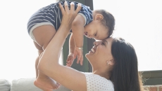Parent holding child