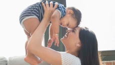Parent holding baby