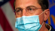 Secretary Alex Azar behind a mask