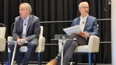 Jeff Coughlin, senior government relations director at HIMSS, left, and  Dr. Steven Lane, clinical informatics director at the Sutter Health Palo Alto Medical Foundation, speak Monday at HIMSS22 in Orlando.