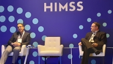 Dr. Steven Waldren, vice president and chief informatics officer at the American Academy of Family Physicians, right, and Dr. Kamel Sadek, director of informatics at Village Medical, speak at the HIMSS22 conference in Orlando.