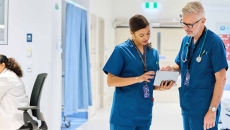 Healthcare workers looking at tablet