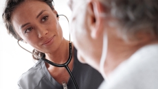 Healthcare worker treating patient