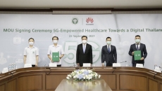 Representatives from Huawei and the Ministry of Public Health pose after signing an MoU
