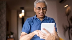 man holding a tablet
