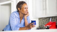Person holding a mug