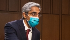Vivek Murthy in a mask