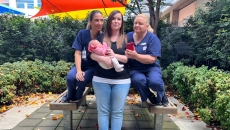 A patient under the Northern Adelaide Local Health Network's Pregnancy Online Platform programme with their midwives.