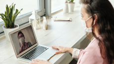 A telehealth visit via laptop