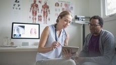 Doctor speaking to patient