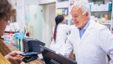 Pharmacist helps a customer