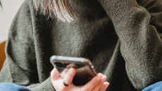 Hand holding smartphone