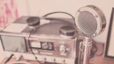 An old-timey microphone and radio setup represent our weekly digital health podcast