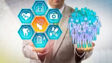 A person in a suit holds graphic healthcare solutions in one hand, and a graphic of people in the other.