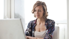 Patient logs into patient portal on laptop