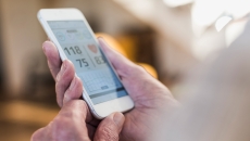 Person using heart rate app on a smartphone