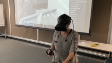 A clinician demonstrating the use of the Vantari VR training platform