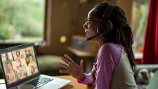 Community health worker holds conference call