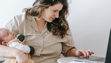 Mother and baby breastfeeding telehealth lactation consult