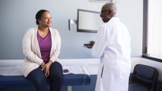 Doctor talking to patient