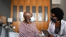 Doctor and patient in masks