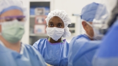 Medical workers in masks and scrubs