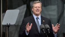 Gov. Charlie Baker at a lectern