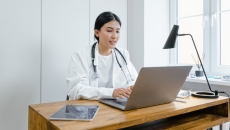 Clinician at a computer