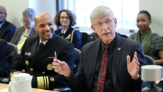 Former Surgeon General Dr. Jerome Adams and Dr. Francis Collins