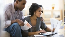 Couple looking at bills