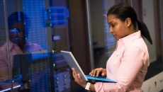 Cybersecurity professional in server room