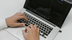 A person with a computer