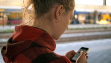 A person checking her smartphone