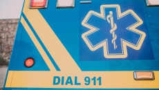 An ambulance with "dial 911" written on it