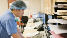 A doctor on a computer