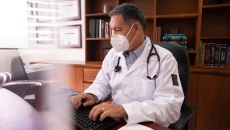 Doctor at computer