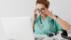 A doctor on a video chat with a patient